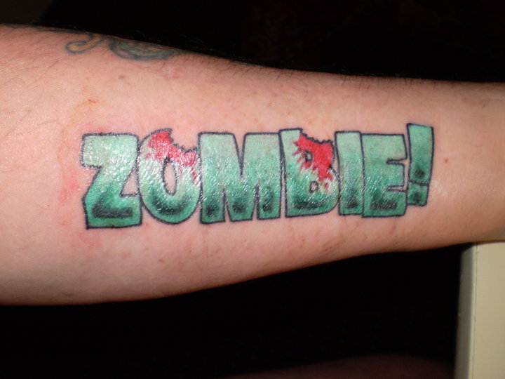A Zombie! fan shows off his ink
